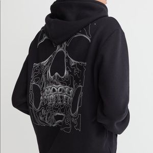 TORN BETWEEN THE LIGHT AND DARK HOODIE